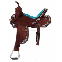 a brown horse saddle with turquoise accents