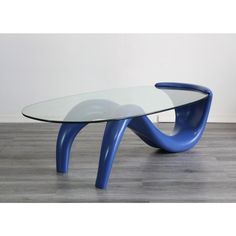 a glass table with blue curved legs