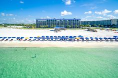 an aerial view of the beach and hotel