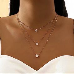 Layered Tiered Zircon Necklace Star, Heart Love, & Teardrop Gold Necklace. Women Layered Tiered Cubic Zirconia Necklace Five-Pointed Star Love Water Drop Necklace. New In Package. Necklace Clavicle Chain. Has Adjustable Chains With The Longest Length 22” Inches, Gold Plated. New In Package. Hearts, Teardrops, Stars Necklace. Water Drop Necklace, Stars Necklace, Necklace Star, Zircon Necklace, Dragonfly Jewelry, Blue Beaded Necklace, Trending Necklaces, Zirconia Necklace, Cubic Zirconia Necklace