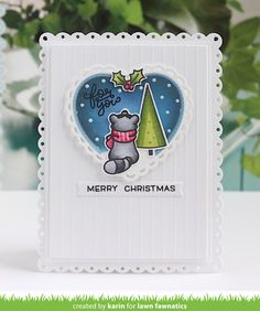 a christmas card with a bear holding a tree