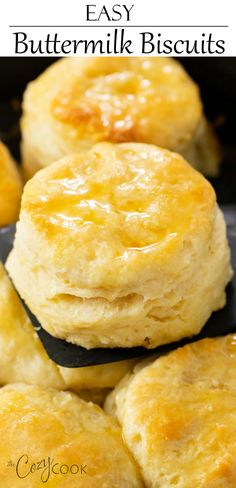 buttermilk biscuits in a cast iron skillet with text overlay that reads easy buttermilk biscuits