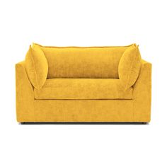 a yellow couch sitting on top of a white floor