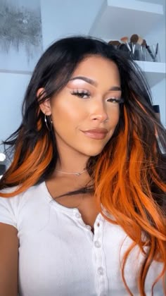 Black And Amber Hair, Black Hair With Orange Peekaboo, Dark And Orange Hair, Black Hair With Orange Underneath, Hair Styles For Shaved Sides, Orange Halo Hair, Orange Peak A Boo Hair, Dark Hair Orange Highlights, Orange Peekaboo Hair Dark Brown