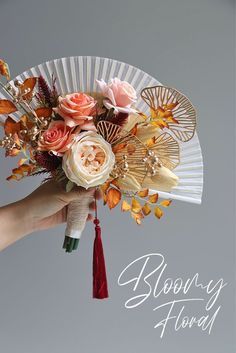 chinese wedding bouquet fan bouquet artificial flowers burnt orange chinese traditional fall wedding bridal bouquet Fan Bouquet Wedding, Bridesmaid Fans Bouquet, Prewedding Bouquet, Japanese Wedding Theme, Flower Fans, Fan Bouquet, Filipiniana Wedding Theme, Yellow Wedding Decorations, Asian Wedding Decor