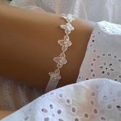 Affordable garter Plus size bridal garter set Plus size Garter belt  Made with cotton lace velastic Beads handcrafted A simple and very stylish accessory. Nice gift for bridesmaids Used mannequin thighs 18inches Never slip On model on request Change (bead color or flexible bench) is made If you contact me i will help you with everything Thank you very much in advance Best regards: Vijdan  :) White Fitted Bridal Belt For Ceremony, Fitted Lace Bridal Belt For Ceremony, White Bridal Belt For Bride, Fitted White Bridal Belt, Lace Bridal Belt For Ceremony, Fitted White Bridal Accessories, White Fitted Bridal Accessories, Bridal Accessories With Lace Trim For Ceremony, Adjustable Lace Bridal Accessories For Ceremony