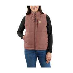 Zip into this Carhartt� Montana Relaxed Fit Insulated Utility Vest for Ladies for an extra layer when the temperature drops. Built out of 4.5-ounce, 100% silicone-coated nylon, it blocks wind and sheds light rain. Lightweight 100% polyester insulation and a sherpa-fleece lining keep your core warm. It's reversible, so you can wear the sherpa side on the outside when you want to mix it up. Rain Defender� durable water-repellent (DWR) technology forces light rain and water to bead up and roll right off. Wind Fighter� technology tames the wind to help retain warmth. This women's vest from Carhartt also features a drop-tail hem for added coverage, zip chest pocket, zip hand pockets, inner zip chest pocket, and inner lower-front pockets. Imported.  Manufacturer style #: 105607. 4.5-ounce, 100% Womens Utility Vest, Carhartt Vest, Utility Vest, Carhartt Womens, Womens Puffer Vest, Carhartt Women, Light Rain, Outerwear Vest, Sherpa Lined