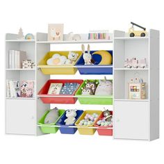 a white bookcase filled with lots of colorful bins next to a stuffed animal