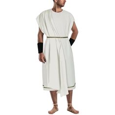 a man wearing a white and black roman costume with his hands on his hips, standing in