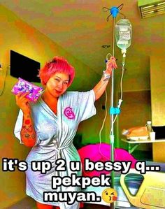 a woman with pink hair standing next to a hospital bed holding an iv drip tube