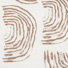 a close up view of a brown and white wallpaper with wavy lines on it