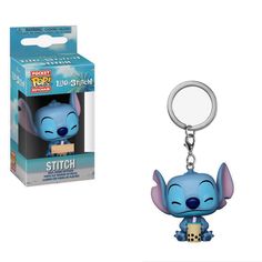 the pop keychain is in front of a box with an image of stitch on it