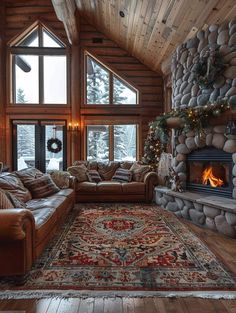 a living room filled with furniture and a fire place in the middle of a room