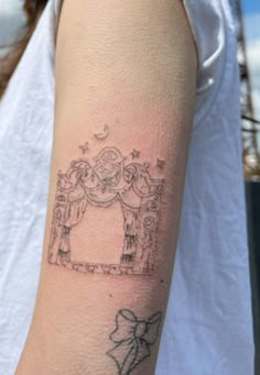 a person with a tattoo on their arm