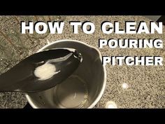 a bowl filled with white liquid and a black spatula on top of it, next to the words how to clean pouring pitcher