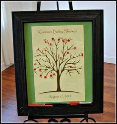 a framed family tree with apples on it