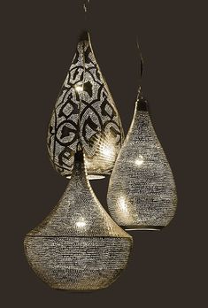 three hanging lamps made out of woven material with intricate designs on the top and bottom