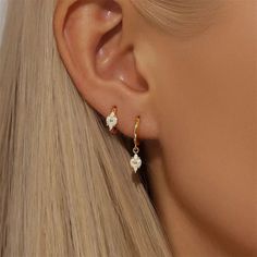 These Marquise Petal Zirconia Hoop Earrings are elegant. These earrings feature delicate marquise-shaped zirconia stones in a floral design. They add subtle sparkle to any outfit. These hoops are perfect for any occasion. The dangling petals make them both sophisticated and trendy. Made from high-quality silver and with top-quality zirconia stones, these lightweight earrings are comfortable and shiny. A must-have versatile and fashionable accessory. Specification:Materials: 925 Sterling Silver P M F, Lightweight Earrings, Halloween Earrings, Earring Sale, Single Earring, Light Weight Earrings, Ring Bracelet, Ring Necklace, Earring Set