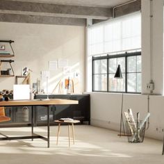 an office space with desk, shelves and chairs in the corner on the floor next to large windows