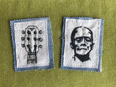 two embroidered patches with pictures of people on them