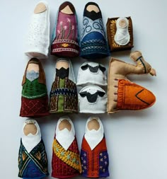 several pairs of shoes made to look like people's feet with different colors and patterns