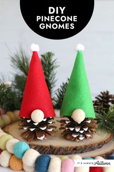 three pine cone gnomes sitting on top of a log