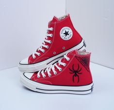 Handcrafted from premium materials, these sneakers not only deliver outstanding aesthetics but also prioritize comfort for your special day. Whether you're walking down the aisle or on the dance floor, Chuck Taylor 1970s embroidered with custom spider webs ensure you stand out every step of the way.          Custom embroidered converse/Spiderweb embroidered shoes/Converse high tops embroidered spiderweb/Spiderweb embroidered sneakers/gift for son  💸 Price include Shoes and floral embroidery as Embroidered Lace-up Sneakers For Streetwear, Spider Man Converse, Spiderman Shoes, Embroidered Shoes Converse, Embroidered Sneakers, Embroidered Converse, Red High Tops, Ellie Shoes, Hand Embroidered Flowers