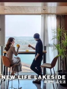 a man and woman sitting at a table in front of a window with the words new life lakeside written on it