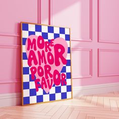 a pink and blue room with a framed poster on the wall that says more armor for favors