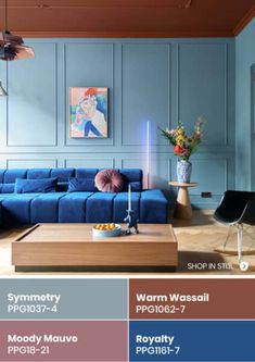 a living room with blue walls and furniture