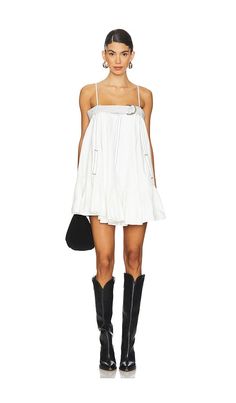 Find FREE PEOPLE X Bay Breeze Mini Dress on Editorialist. Free People x REVOLVE Bay Breeze Mini Dress in Ivory. - size L (also in XL) Free People x REVOLVE Bay Breeze Mini Dress in Ivory. - size L (also in XL) 100% cotton. Made in India. Machine wash. Unlined. Pull-on styling with attached buckle at neckline. Adjustable shoulder straps. Denim textile with side seam pockets. FREE-WD2871. OB2008250. Free People invokes a spirit of femininity and creativity. Throughout their line of sweaters, tees, Revolve Outfits, White Bachelorette, Free People Sweater Dress, Bay Breeze, Bday Wishlist, Mini Dress Outfits, Revolve Dresses, Free People Mini Dress, Bachelorette Outfits