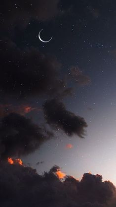 the night sky is filled with stars and clouds as the moon shines in the distance