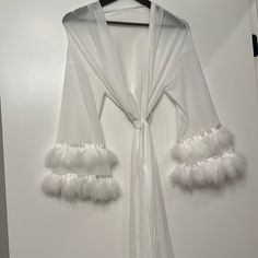 Sexy & Luxurious White Bridal Robe Sleeves Add The Wow-Factor Perfect For A Bride And Wedding Perfect Condition, Brand New, Never Worn Size: Small Long White Bridal Robe, Fuzzy White Robe, Feminine White Robe For Sleep, Bridal Robe With Feathers, White Long-sleeved Robe For Brides, Wedding Day Robes, White Bridal Robe, White Fur, Sleepwear Robe