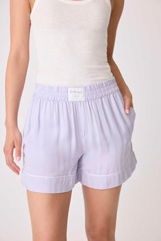 This item is Final Sale. Relax in chic comfort in woven matte sateen pajama shorts, crafted with a high-waist fit and boxer-style waist in a soothing lavender shadow stripe. Ideal for warm nights or lounging, these shorts offer both luxe style and ease. Look for our Women Empowered Factory symbol on styles in this collection. Women Empowered Factory = At least 51 percent owned, controlled, or managed by a woman or women. Women Jogger Pants, Luxe Style, Pj Shorts, Purple Ombre, Joggers Womens, Boxer Shorts, Pajama Shorts, Pj Sets, Jogger Pants