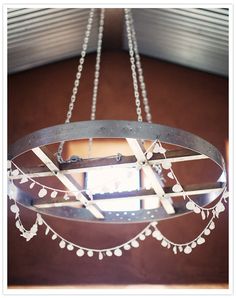 a chandelier hanging from the ceiling in a room