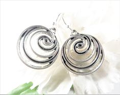 Boho silver spiral charm earrings. They are lightweight and perfect to wear all year long, any time of day. They are so affordable that you should grab a pair for yourself as well. (Longer kidney wires are available as well in separate listing.) 💜Materials: Antique silver spiral charms, Silver plate ear wires (lead and nickel free). 💜Shipping: This jewelry is ready to ship and ships the same or next business day via USPS First Class Mail which generally has an estimated 2-6 business day delive Hindu Jewelry, Spiral Jewelry, Plate Jewelry, Swirl Earrings, Jewelry Safe, Spiral Earrings, Earrings Geometric, Earrings Elegant, Silver Plated Jewelry