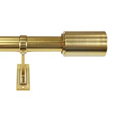 an image of a gold curtain rod on a white background