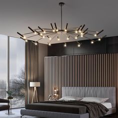 a bedroom with a large bed and lights hanging from the ceiling