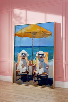 two poodles sitting under an umbrella in front of a painting on the wall