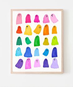 watercolor ghost print on white paper with wooden frame