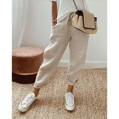 Crafted with a solid hue, these Isabella Women Joggers are the perfect combination of fashion and function. Enjoy the mid-rise waist and full range of motion for activities year-round. Layer up for winter or keep it simple in the summer — the styling possibilities are endless! Pocket details provide handy storage for keys and wallets, so you can say goodbye to toting around bulky bags. Effortless sophistication and maximum comfort — what more could you need? Get your pair of Isabella Women Joggers today and look chic whatever the season! Casually Chic, Cotton Casual Pants, Slacks For Women, Slack Pants, Solid Color Pants, Liberia, Estilo Chic, Casual Sporty, Loose Pants