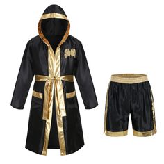 a black robe and shorts with gold trim