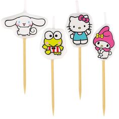 hello kitty cupcake toppers on toothpicks with wooden sticks in the shape of animals