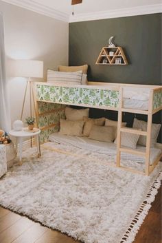 a bedroom with a bunk bed and white rug