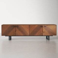 the sideboard is made out of wood and metal