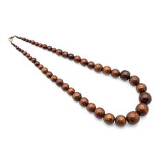 PRICES MAY VARY. MADE THE NATURAL WAY: Using traditional handmade methods with ethically sourced Brazilian walnut wood COMPLETE YOUR LOOK: Whether casual, formal, these versatile wood bead necklaces add a final touch to any occasion SUPPORT AN ETHICAL TRADE PROGRAM: Supports Brazilian artisans and their communities, not manufacturers selling mass-produced wooden beads AVAILABLE IN MULTIPLE OPTIONS: Choose from a choice of natural wood, black, or other finishes GREAT GIFT: Give the Nanalou wooden Long Neckless, Chunky Bead Necklaces, Wooden Bead Necklaces, Wood Bead Necklace, Bead Necklaces, Final Touch, Necklace Black, Beads Necklace, Strand Necklace