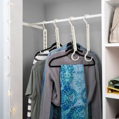 the closet is filled with clothes and other things to wear for work or just play