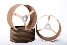 the wheels are made out of wood and have spokes