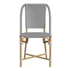 a grey and white chair with wicker seat padding on the back, side view