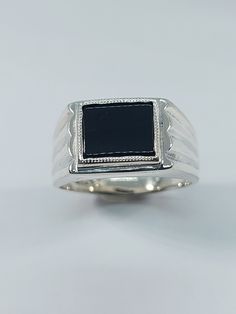 This elegant, Onyx Signet Ring has been carefully handcrafted in 925 Sterling Silver and authentic Onyx.  This impressive ring is great for any occasion! buy it for someone special or buy it for your-self! Upon request a personalized message can be added to the inside of the ring. Once ring has been shipped a tracking number will be provided to you.   Ring is size 10 but it can be resized at no extra cost and it will be shipped to you in an elegant gift box. Ring weights 9.8 grams Face of the ri Ring Men Silver, Onyx Rings, Onyx Ring Men, Onyx Signet Ring, Under Lock And Key, Rome Antique, Box Ring, Ring Men, Ring Mens